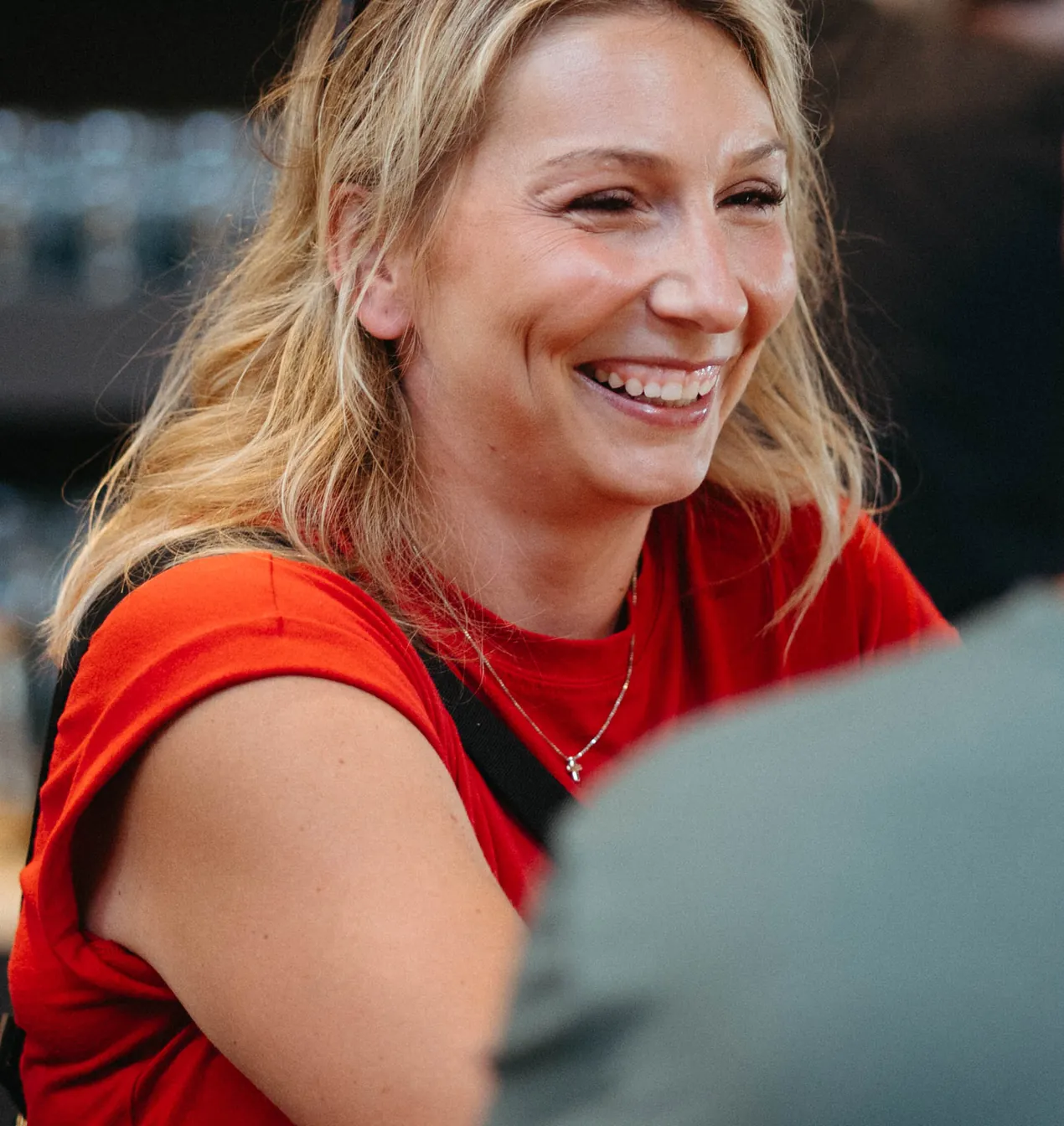 A Movement teammate laughing at an event