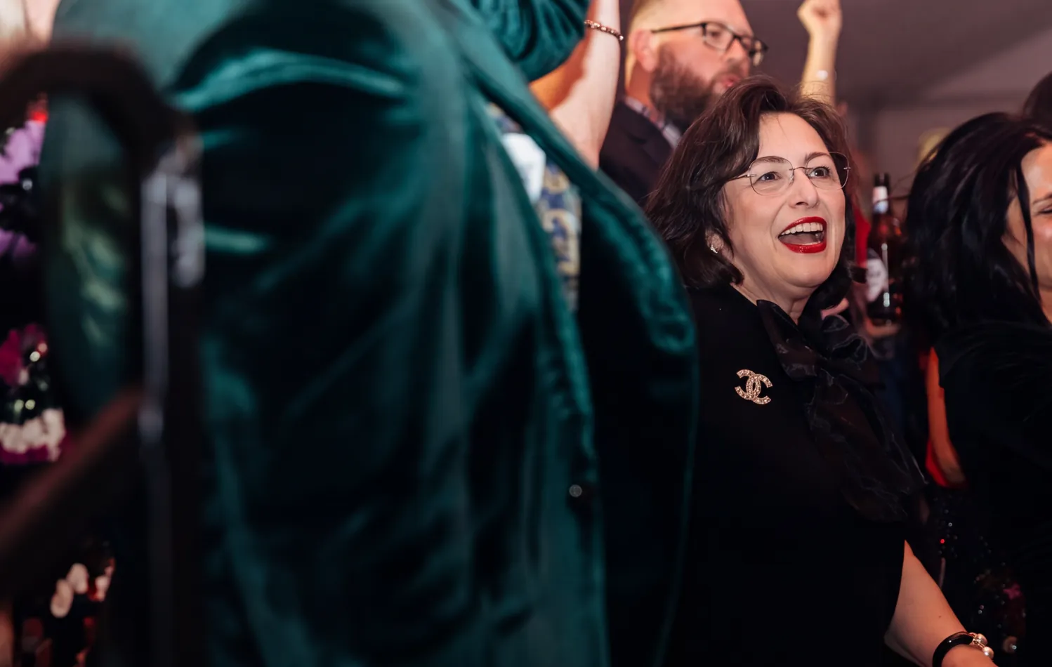 Teammates celebrating at a Movement event